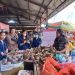 Jurusan Administrasi Bisnis Polimdo Melakukan Pengabdian Pada Masyarakat di Pasar Tomohon